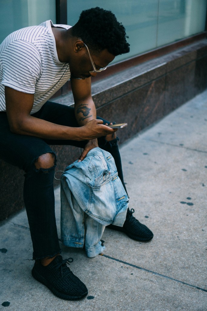 Man scrolling on phone